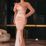 Robe sirène rose poudré brillante