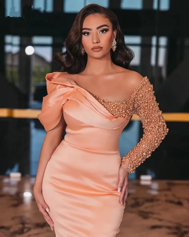 Robe sirène rose poudré