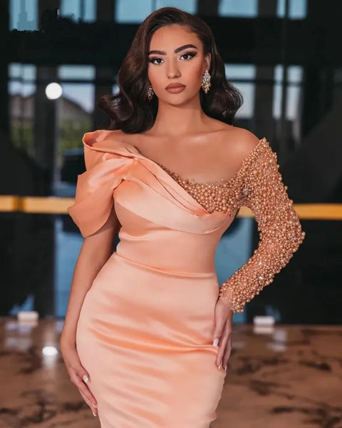 Robe sirène rose poudré